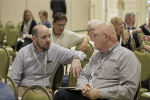 Greg Futral and Brian Whitney conversing at the SASH annual conference