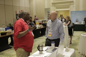 Sam Black shares with an attendee the benefits of Covenent Eyes at the SASH annual conference